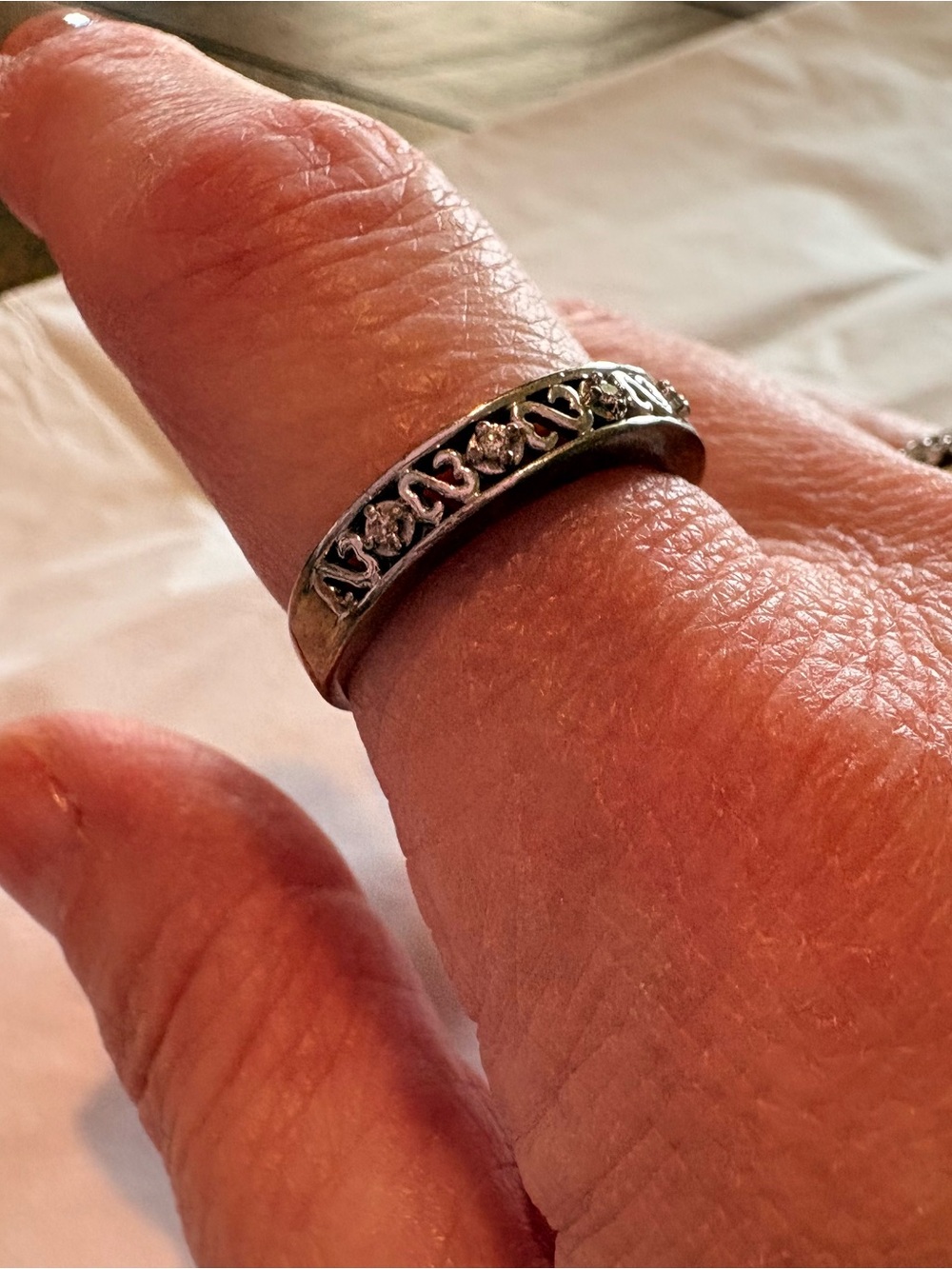 925 sterling silver open hearts ring with accent diamonds. Size 8.